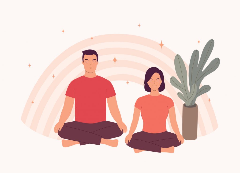 Smiling Young Couple Sitting In Cross-Legged And Eyes Closed Doing Meditation Together. Isolated On Color Background.
